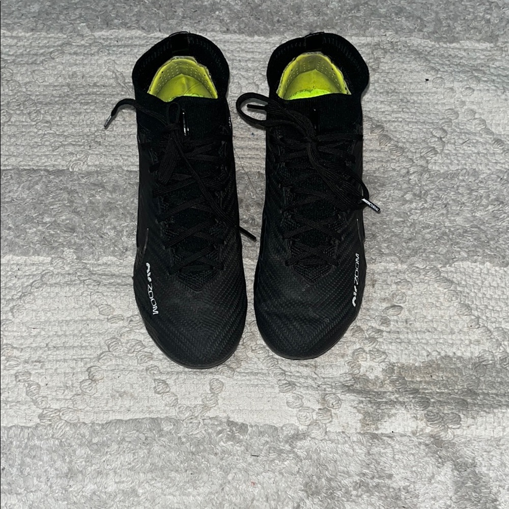 Nike soccer cleats , neon green with black, worn only on turf and a few times